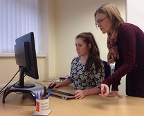 Placement student Ellie working at computer | Technical translators