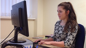 Placement student Ellie working at computer | News | Technical translators