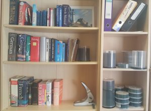 Bookshelf in office | Blog | Expert professional translators