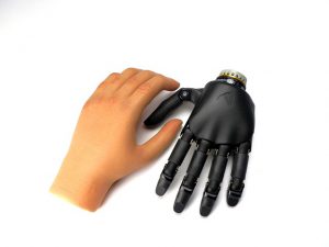 Human hand next to Robot hand | Blog | German translation services