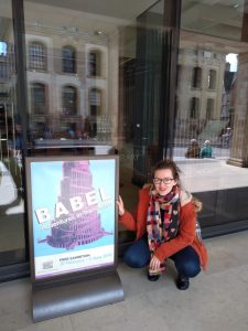 Hollie next to exhibition poster | Blog | Technical translators
