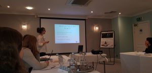 Team member Hollie holding a presentation at LKTeam day | Technical and commercial translation