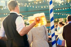 A server with beers at Oktoberfest